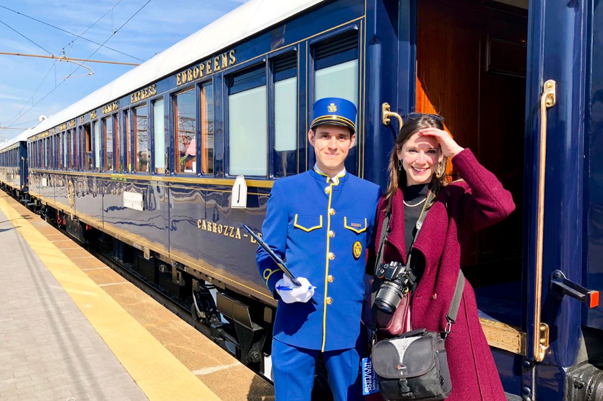 outside-european-luxury-train-staff-and-traveler.